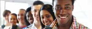 Image of teenagers lined up smiling