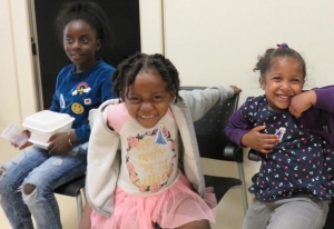smiling kids attending Health & Wellness Day at Jane St. Hub